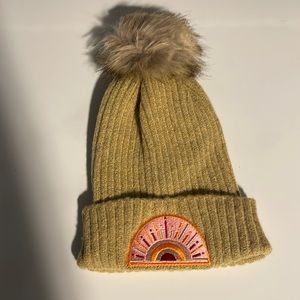 Beanie with pom pom and sun patch